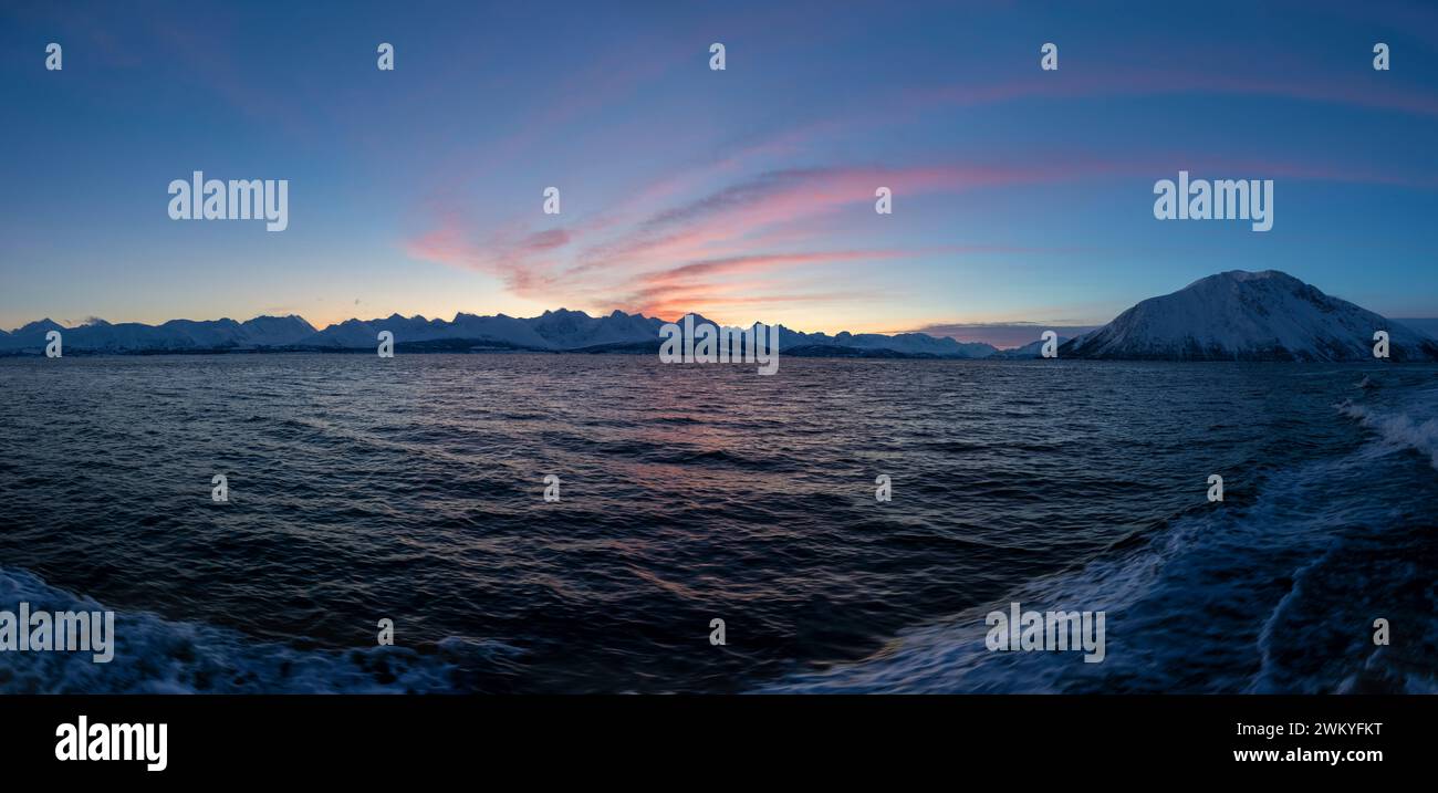Europe, Norway, Tromso, Troms County, Panoramic Views of the Lyngen Alps across Ullsfjorden at Dawn Stock Photo