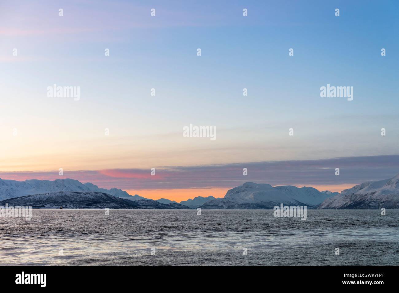 Europe, Norway, Troms County, The Lyngen Alps across Ullsfjorden at Dawn Stock Photo
