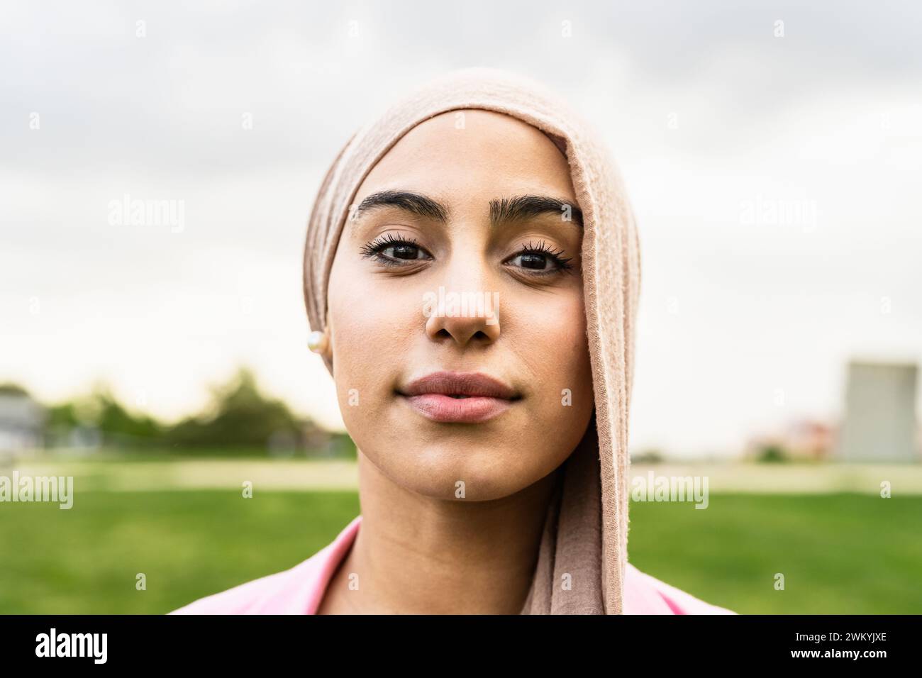 Portrait of Muslim woman looking in front of camera Stock Photo