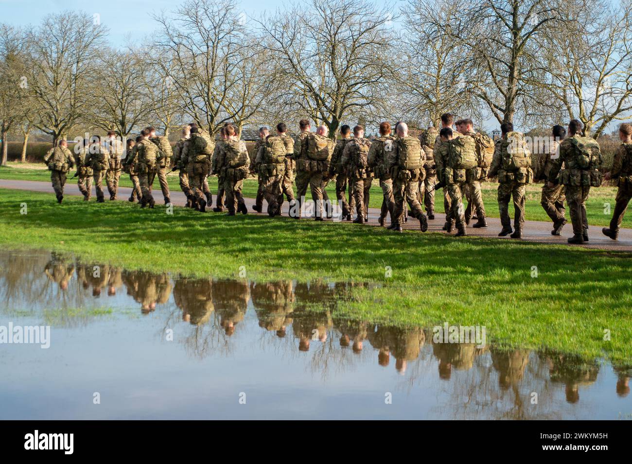 Windsor, Berkshire, UK. 23rd February, 2024. Reflections of troops out on a training exercise in Windsor Great Park. Following heavy rain in the past few days, there is flooding in parts of Windsor Great Park in Windsor, Berkshire. Credit: Maureen McLean/Alamy Live News Stock Photo