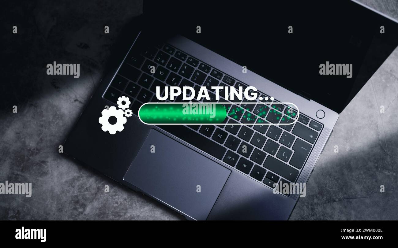 Top view photo of laptop with update concept. Software upgrade interface with empty space for use. Stock Photo