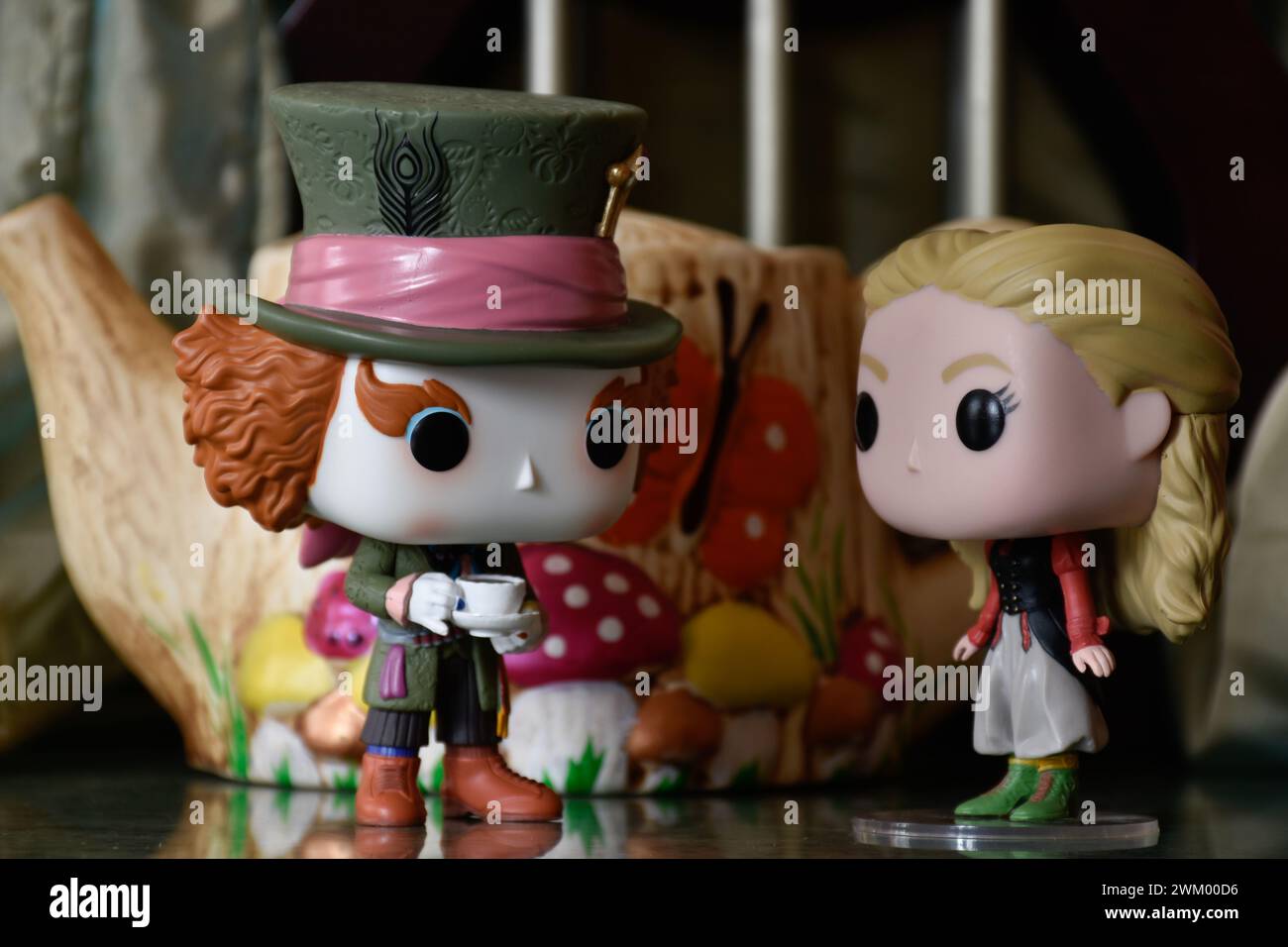 Funko Pop action figures of Mad Hatter and Alice in Wonderland. Palace ...