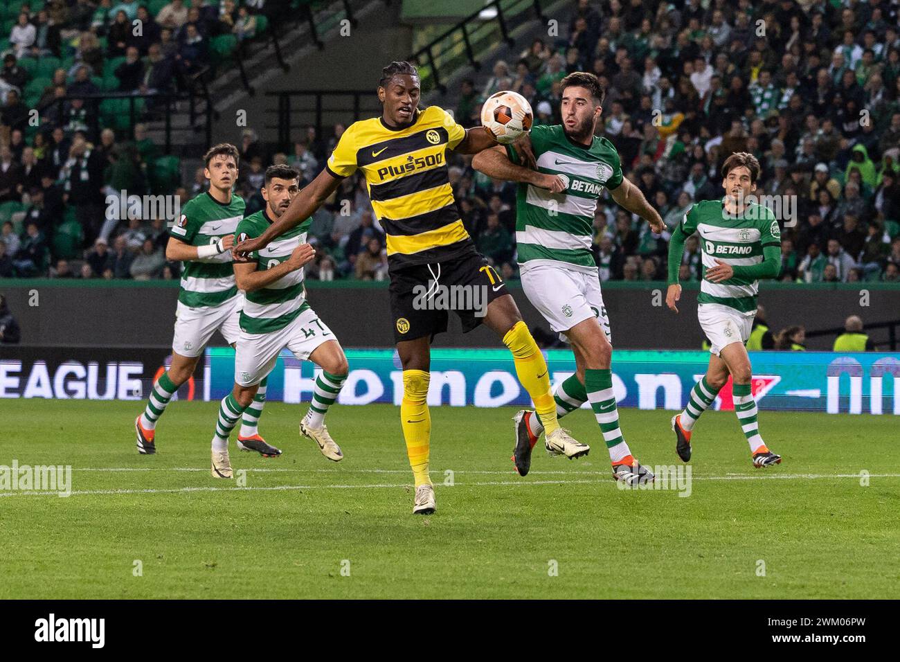 February 22, 2024. Lisbon, Portugal. Young Boys's forward from Portugal Joel Monteiro (77) and Sporting's defender from Portugal Goncalo Inacio (25) in action during the game of the 2nd Leg of the Playoffs for the UEFA Europa League, Sporting vs Young Boys Credit: Alexandre de Sousa/Alamy Live News Stock Photo