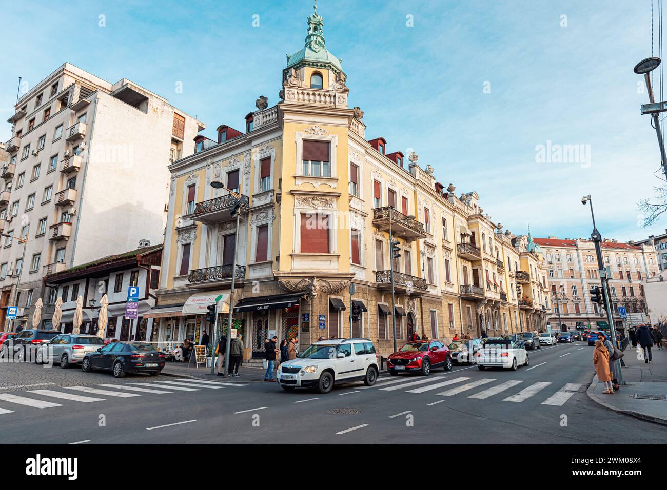 02 January 2024, Belgrade, Serbia: City street in old town with parked cars Stock Photo