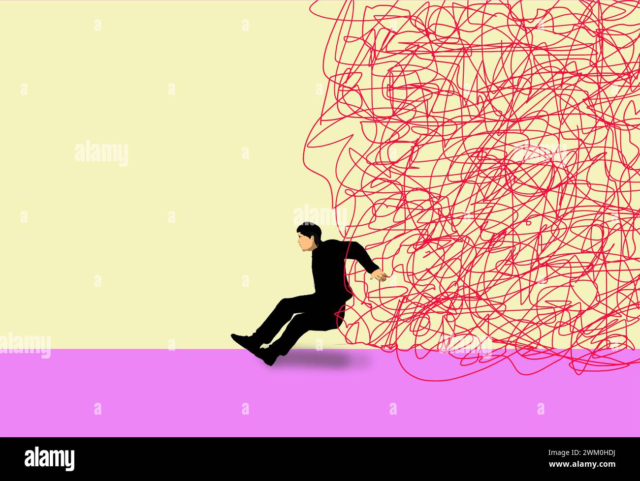 Man struggling to hold back large tangled strings Stock Photo