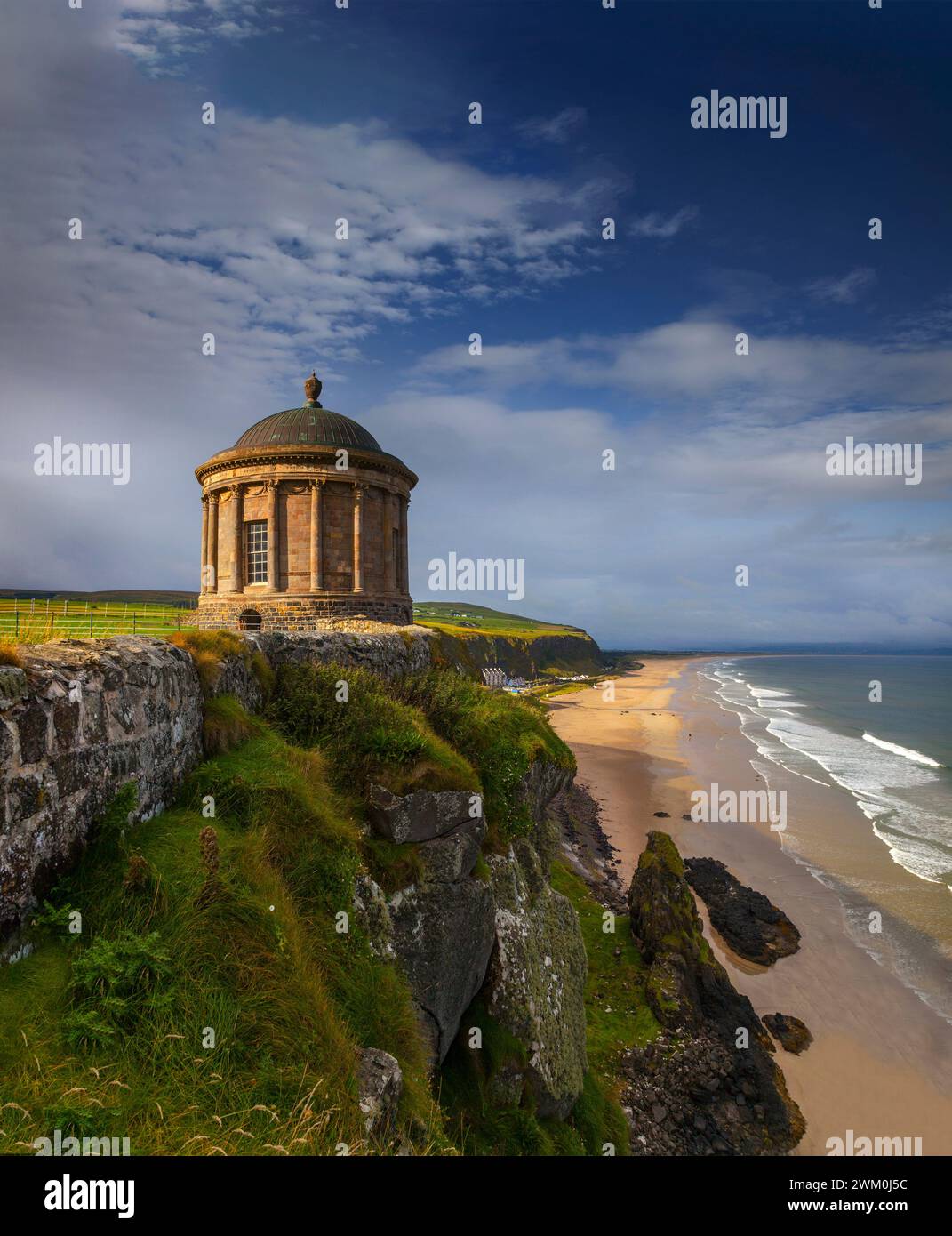 The Mussenden Temple overlooking the Atlantic Ocean and Downhill Strand, in County Derry, Northern Ireland. Stock Photo
