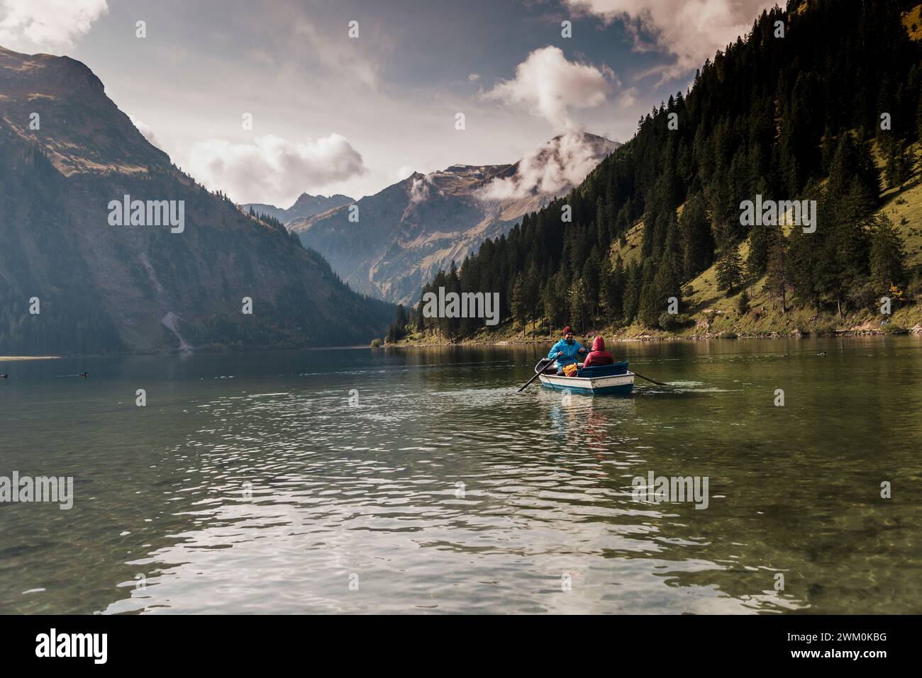 Couple riding in rowing boat hi-res stock photography and images - Alamy