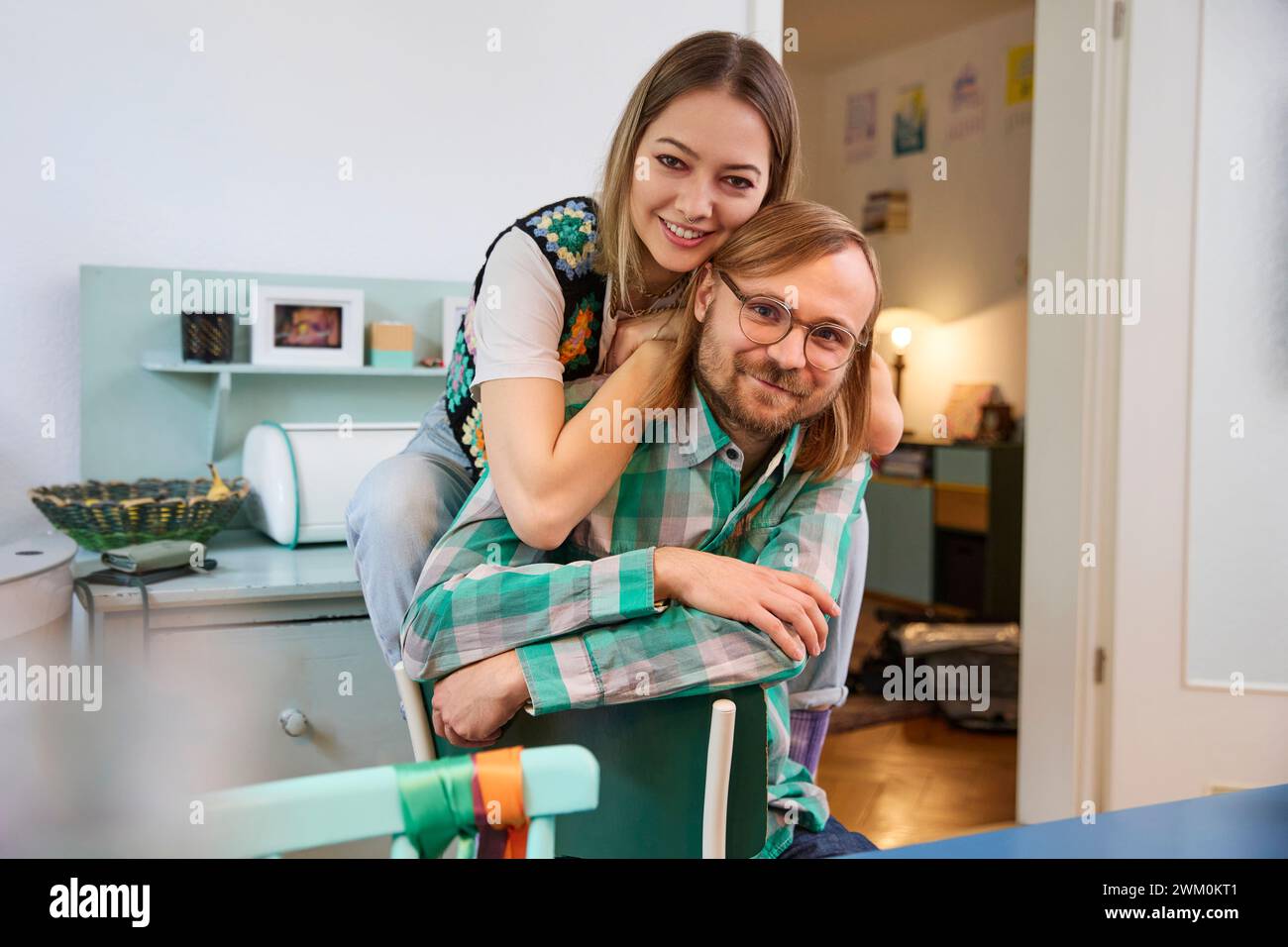 Happy man woman sitting hi-res stock photography and images - Alamy