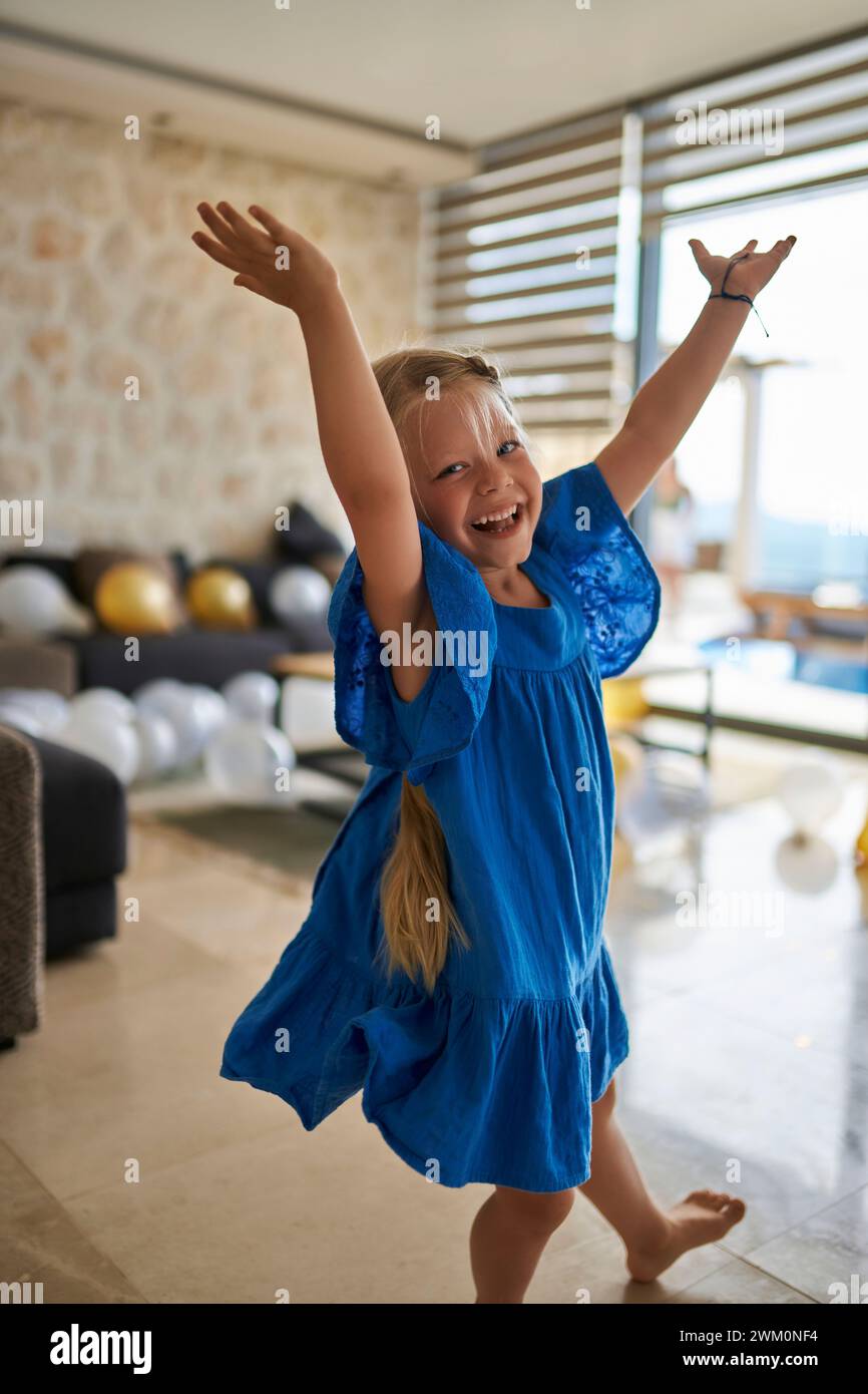 Tourist girl standing arms hi-res stock photography and images - Alamy