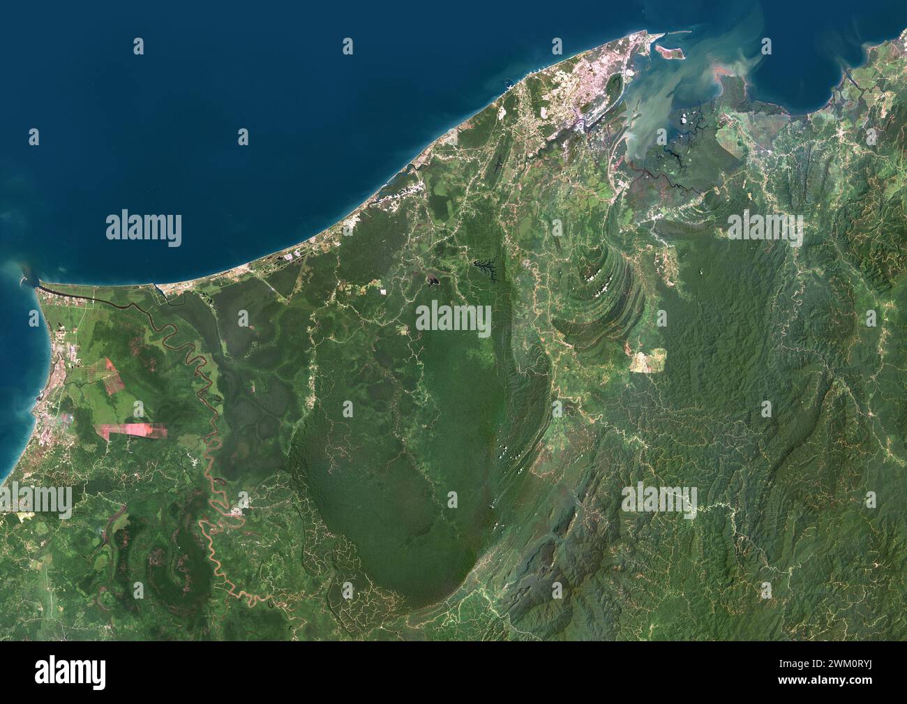 Color satellite image of Brunei. The country is  located on the north coast of the island of Borneo in Southeast Asia. Stock Photo