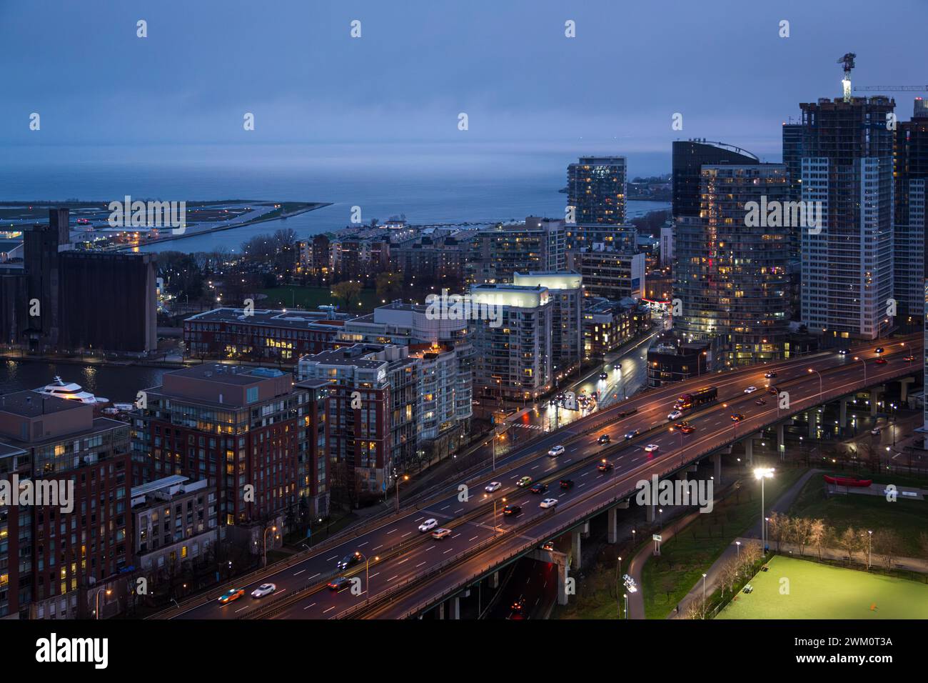 Canada, Ontario, Toronto, Aerial view of traffic on elevated city road at dusk Stock Photo