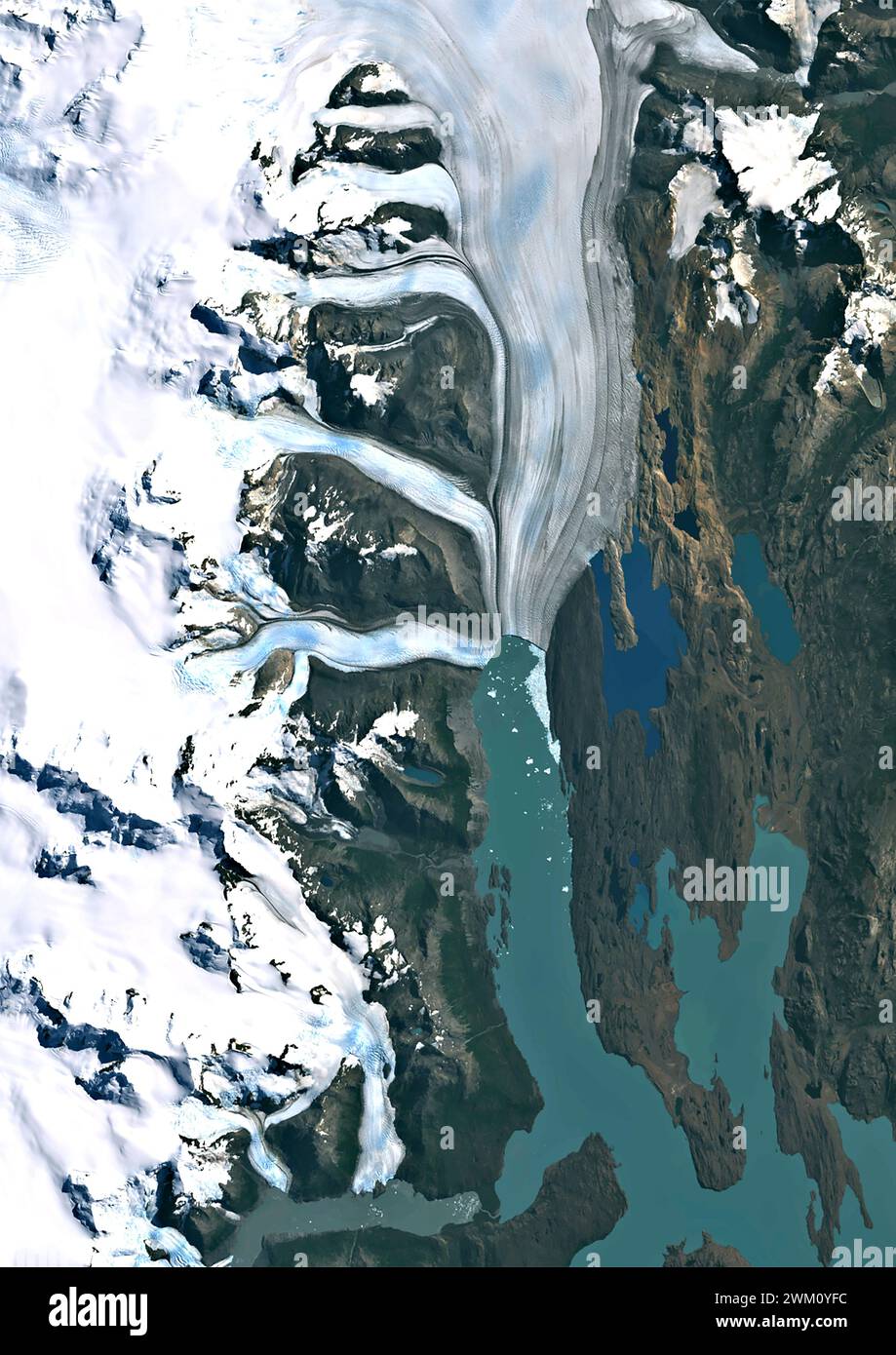 Color satellite image of Upsala Glacier in Argentina’s Los Glaciares National Park in 2021. It has experienced significant retreat over the past century. Its melting indicates climate warming in this part of South America. Stock Photo