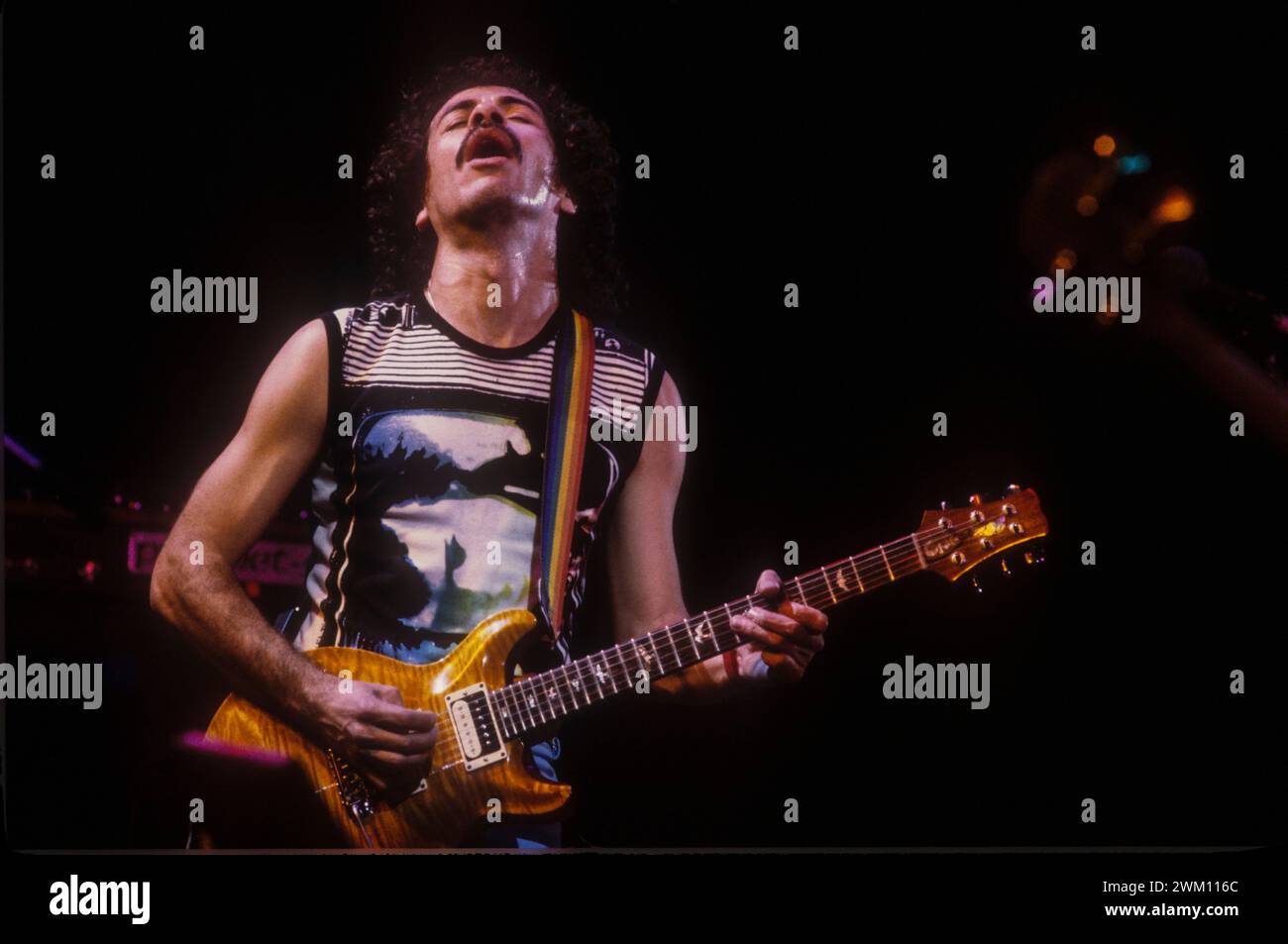 3824877 Carlos Santana; (add.info.: Rock guitarist Carlos Santana performing (about 1985) / Il chitarrista Carlos Santana in concerto (1985 circa)); © Marcello Mencarini. All rights reserved 2024. Stock Photo