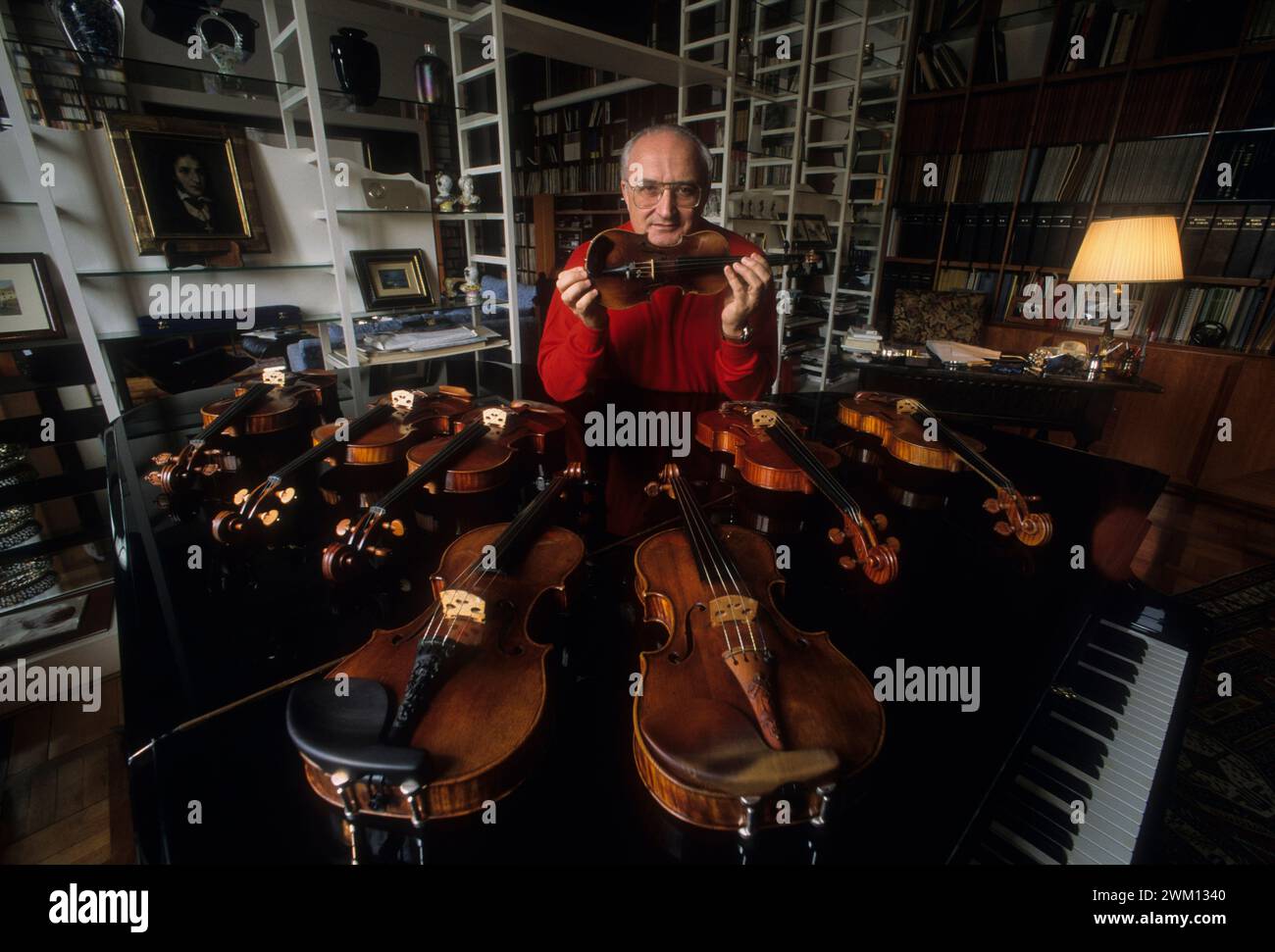 3827191 Salvatore Accardo in his house (Rome, 1993) Salvatore Accardo; (add.info.: Rome, 1993. Violinist Salvatore Accardo showing his collection of violins in his house  / Rome, 1993. Il violinista Salvatore Accardo mostra la sua collezione di violini a casa  sua); © Marcello Mencarini. All rights reserved 2024. Stock Photo