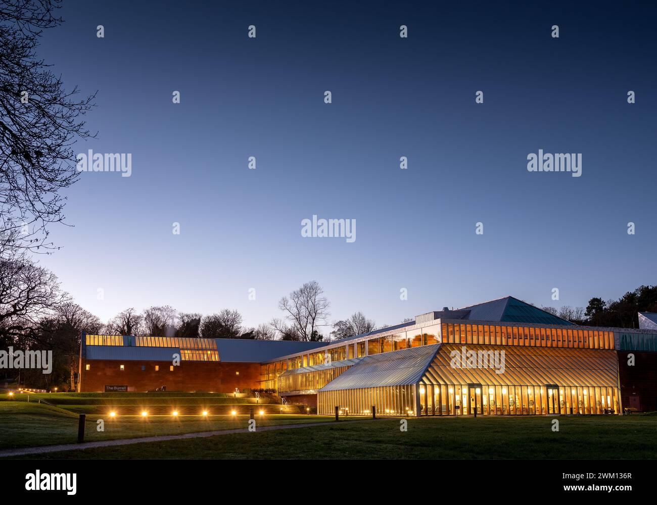 Night shot of exterior of the Burrell Collection Museum and Art Gallery building, within Pollok Park in Glasgow, Scotland, UK Stock Photo