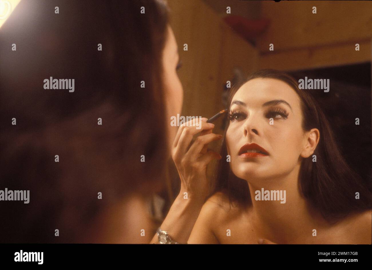 3831727 Carole Bouquet; (add.info.: French actress Carole Bouquet putting makeup on (about 1985) / L'attrice Carole Bouquet mentre si trucca (1985 circa)); © Marcello Mencarini. All rights reserved 2024. Stock Photo
