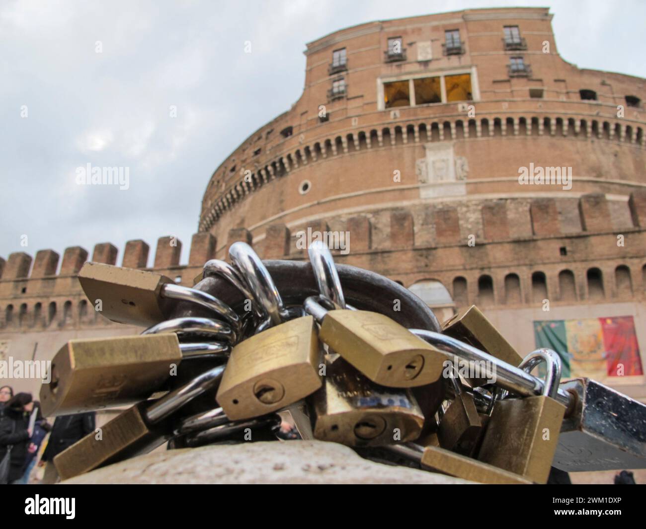 4067729 Rome, 2011. Padlocks on Ponte Sant'Angelo put by couples in love as a symbol of their bond. This trend derives from book 'Tre metri sopra il cielo' (Three Meters Above the Sky) by Federico Moccia and initially concerned only the Milvian Bridge, but then it spread to other bridges in the city; (add.info.: Rome, 2011. Padlocks on Ponte Sant'Angelo put by couples in love as a symbol of their bond. This trend derives from book 'Tre metri sopra il cielo' (Three Meters Above the Sky) by Federico Moccia and initially concerned only the Milvian Bridge, but then it spread to other bridges in Stock Photo