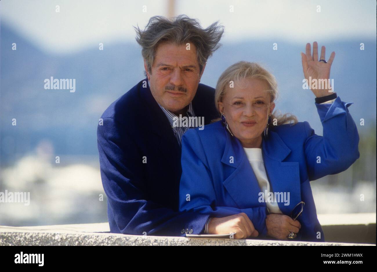 4069400 Cannes Film Festival, 1991. Actors Marcello Mastroianni, And Jeanne Moreau starring of the movie 'The Suspended Step of the Stork' (To meteoro vima tou pelargou) directed by Theo Angelopoulos (photo); (add.info.: Cannes, France; Francia,   Festival del Cinema di Cannes 1991. Gli attori Marcello Mastroianni E Jeanne Moreau, in concorso con il film 'Il passo sospeso della cicogna' (To meteoro vima tou pelargou) di Theo Angelopoulos); © Marcello Mencarini. All rights reserved 2024. Stock Photo