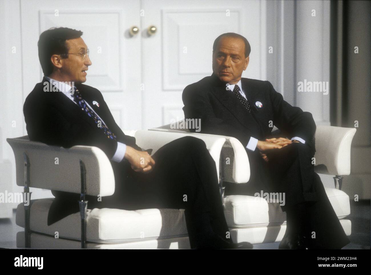 MME4770892 Politicians Gianfranco Fini and Silvio Berlusconi during the TV program 'Porta a Porta' to present the electoral program of their party, 1996 (photo); (add.info.: Politician Silvio Berlusconi takes part in the TV program 'Porta a Porta' to present the electoral program of his party, the 'Polo delle Libert' (PDL)); © Marcello Mencarini. All rights reserved 2024. Stock Photo