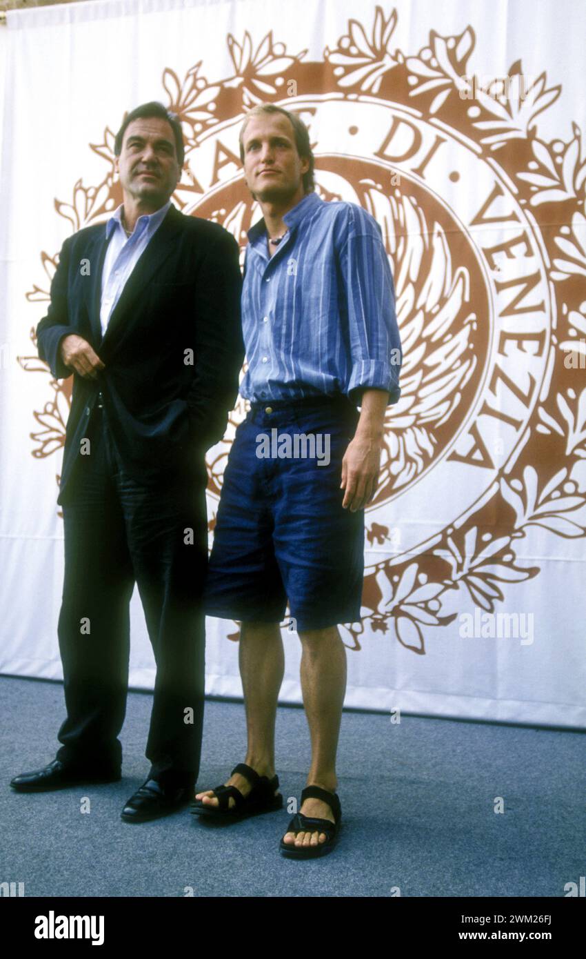 MME4786993 Venice Lido, Venice Film Festival 1994. American director Oliver Stone and actor Woody Harrelson at photocall of the movie “” Natural Born Killers”/Lido di Venezia, Venice Film Festival 1994. He registered Oliver Stone and Attore Woody Harrelson in the photocall of the film “Natural Born Killers-Assassini nati”” -; (add.info.: Venice Lido, Venice Film Festival 1994. American director Oliver Stone and actor Woody Harrelson at photocall of the movie “” Natural Born Killers”/Lido di Venezia, Venice Film Festival 1994. He registered Oliver Stone and Attore Woody Harrelson in the photoca Stock Photo
