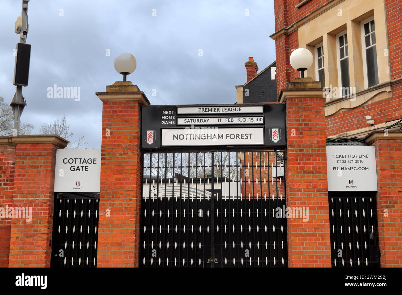 Gates of Craven Cottage football stadium in West London, home of Fulham F.C., advertising match vs. Nottingham Forest Stock Photo