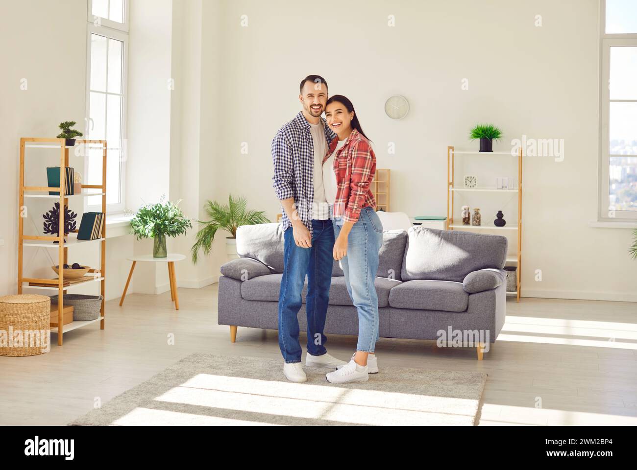 Joyful positive family buying hi-res stock photography and images - Alamy