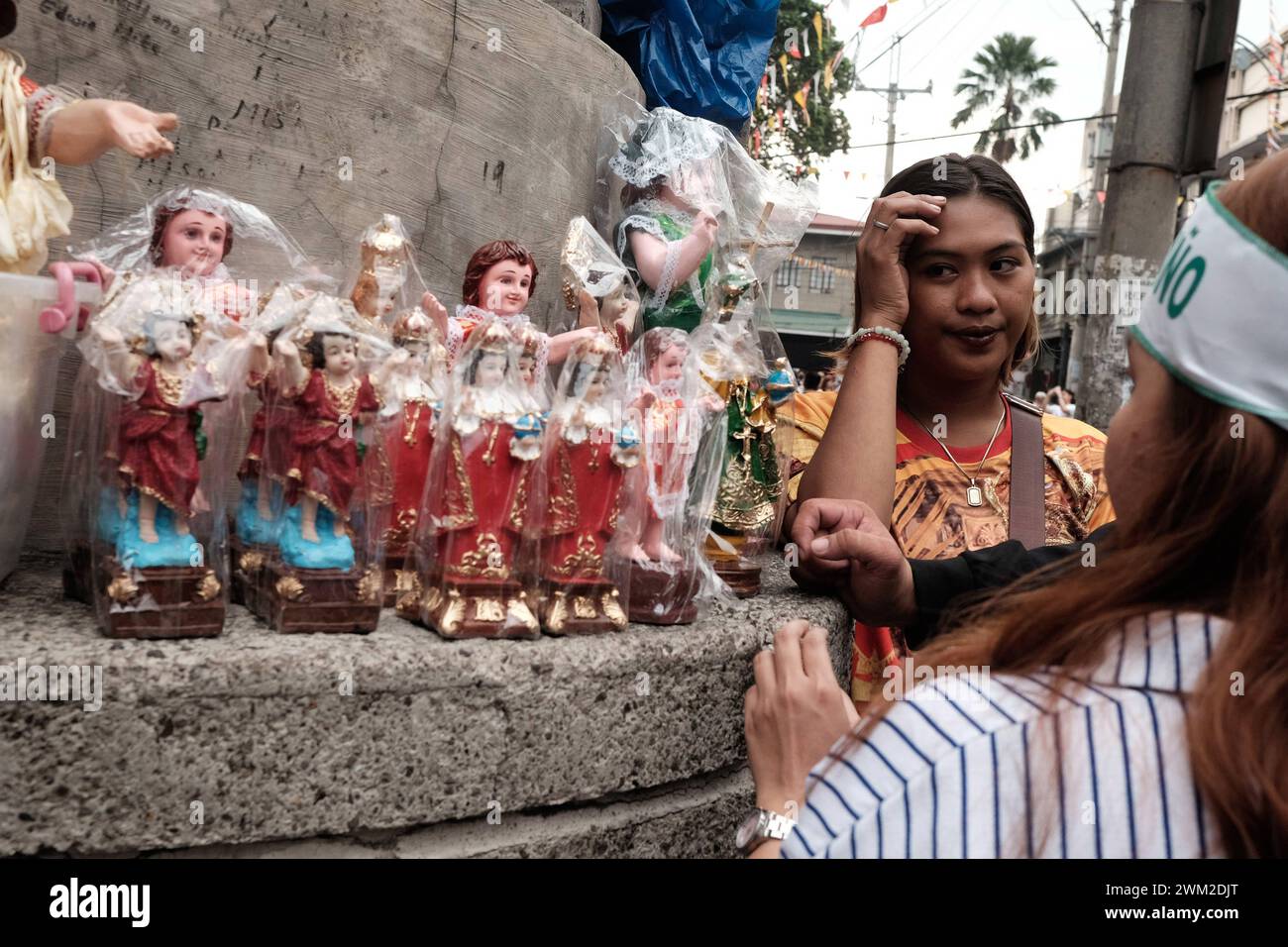 Annual Feast of the Child Jesus celebrated in Manila Thousands of catholic faithful joined the annual celebration of the Feast of the Holy Child Jesus  Santo Nino  on 21 January 2024. Organized by the Sto. Nino de Tondo Church in Tondo, Manila, Philippines, devotees joined the procession, chanted, and paraded their statue of the Child Jesus to be blessed by holy water during the celebration every third week of January. Sto. Nino is regarded as one of the oldest artifacts of Catholicism in the Philippines. According to history, Ferdinand Magellan brought with him a vast number of images from Sp Stock Photo