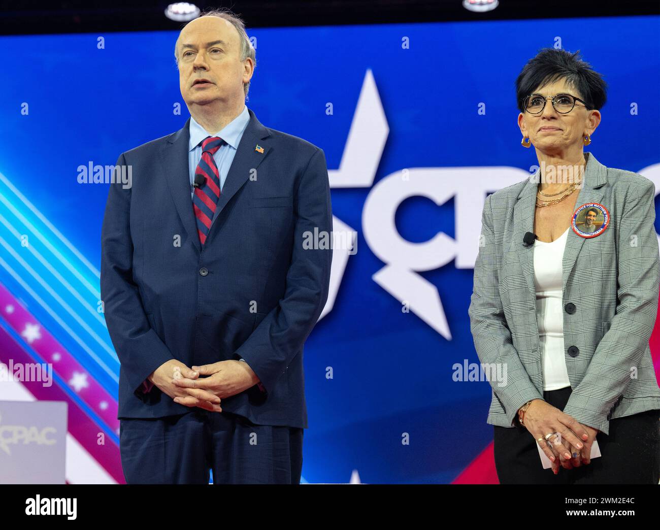 Maryland, USA. 23rd Feb 2024. Former United States Assistant Attorney General Jeffrey Clark, Director of Litigation, Center for Renewing America, left, and Geri Perna, Aunt of Matthew Perna, right, appear on a panel titled “The Dust-Up” at the 2024 Conservative Political Action Conference (CPAC) in National Harbor, Maryland, US, on Friday, February 23, 2024. Credit: Ron Sachs /CNP /MediaPunch Credit: MediaPunch Inc/Alamy Live News Stock Photo