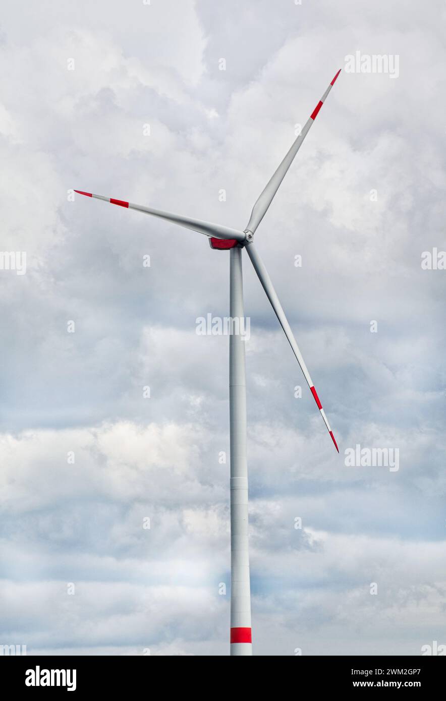 wind turbine against cloudy sky Stock Photo - Alamy