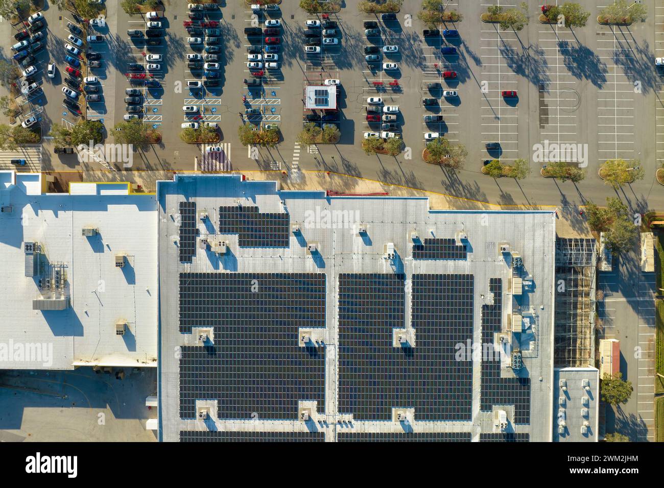 Electric photovoltaic solar panels installed on shopping mall building ...