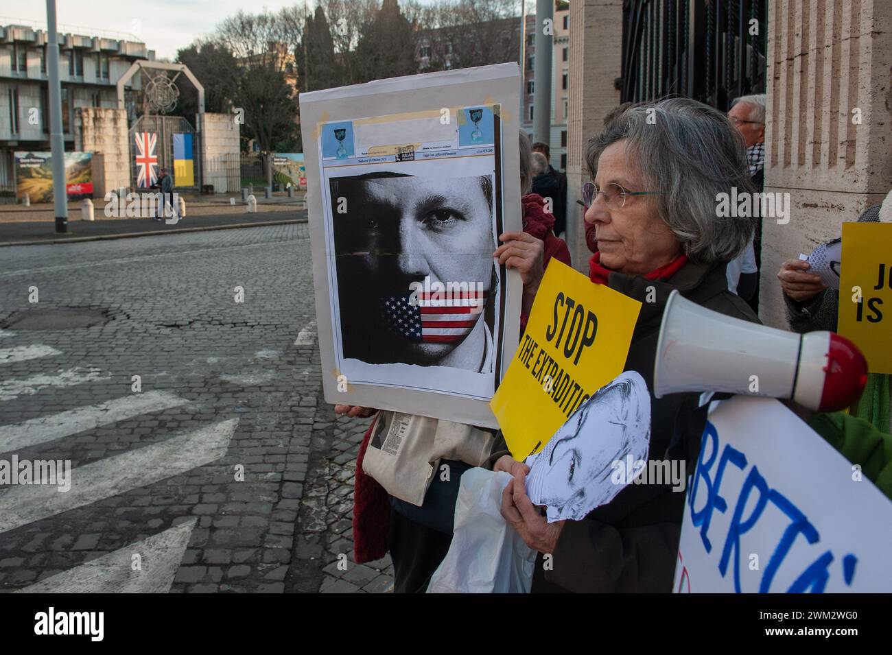 February 20, 2024 - Rome, Italy: demonstration in front of the British embassy on the day the High Court in London considers Julian Assange's latest appeal to avoid extradition to the US. © Andrea Sabbadini Stock Photo