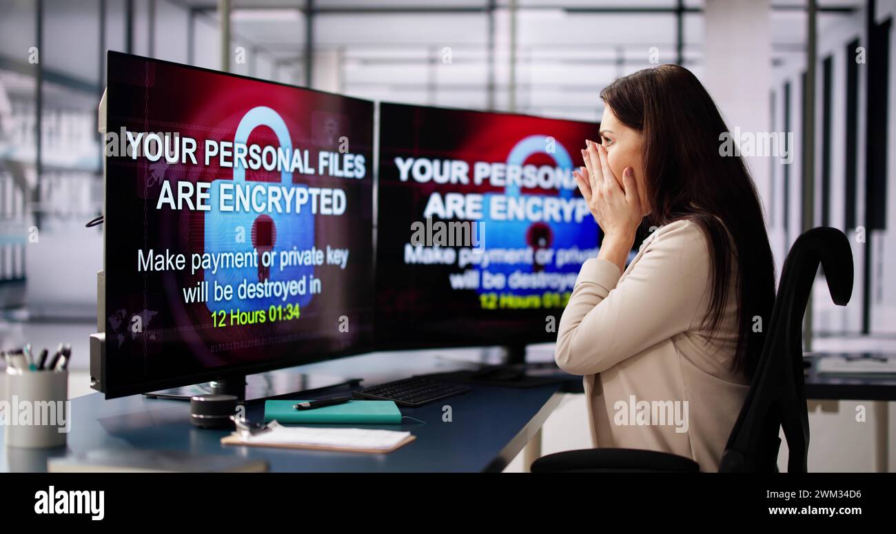 Ransomware Malware Cyber Attack On Business Computer Stock Photo