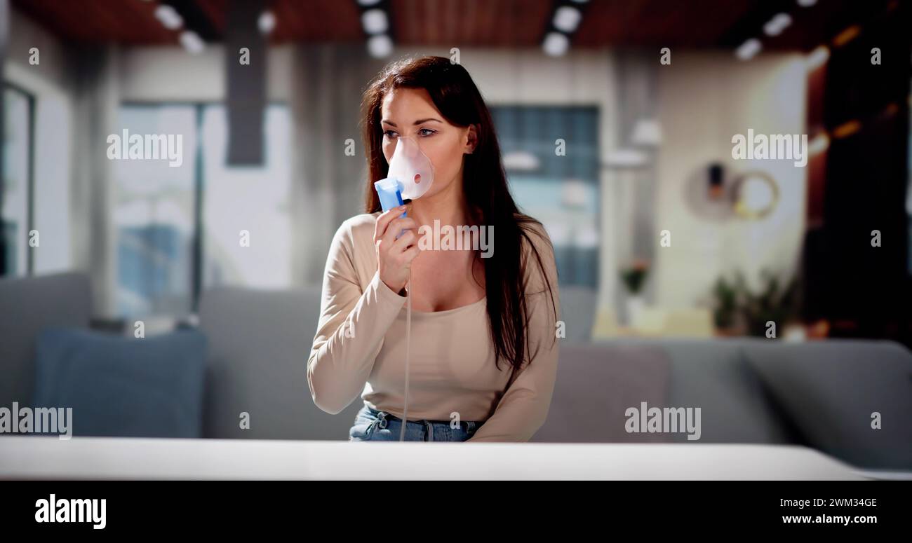 Asthma Patient Breathing Using Oxygen Mask And COPD Nebulizer Stock Photo