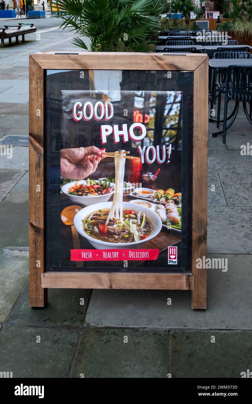 Folding sign outside Vietnamese restaurant on Castle Street city centre Liverpool Stock Photo