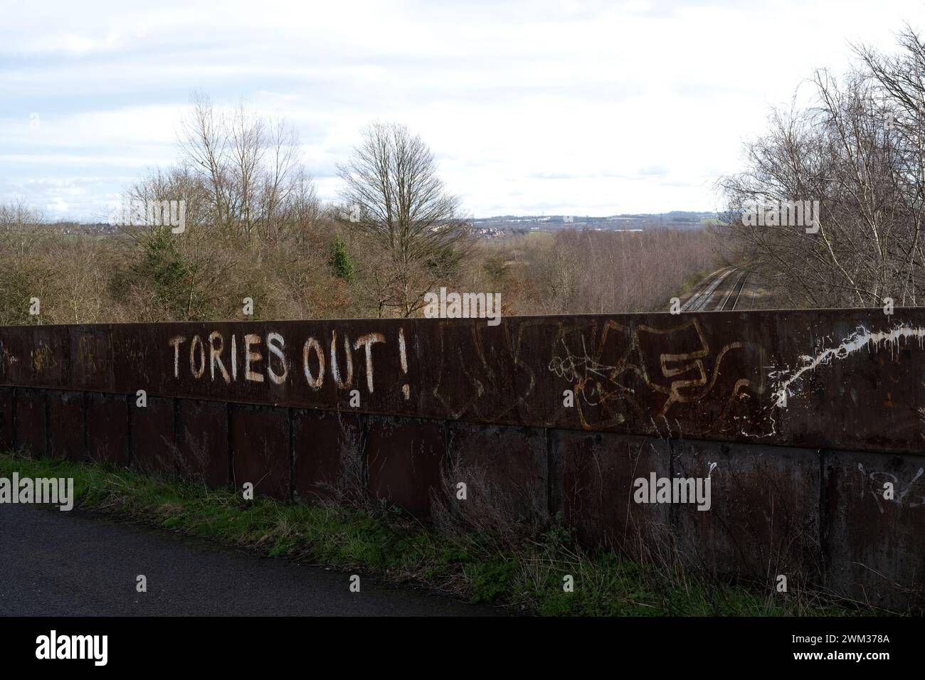 Tories Out! graffiti on Orgreave railway bridge near site of Battle of Orgreave during the 1984 miners strike, Sheffield Stock Photo