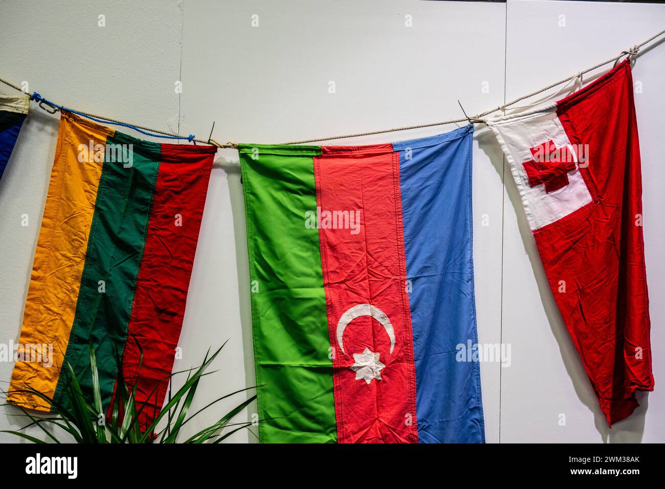 Wrinkled flags of Lithuania Azerbaijan and Tonga on a wall Stock Photo ...