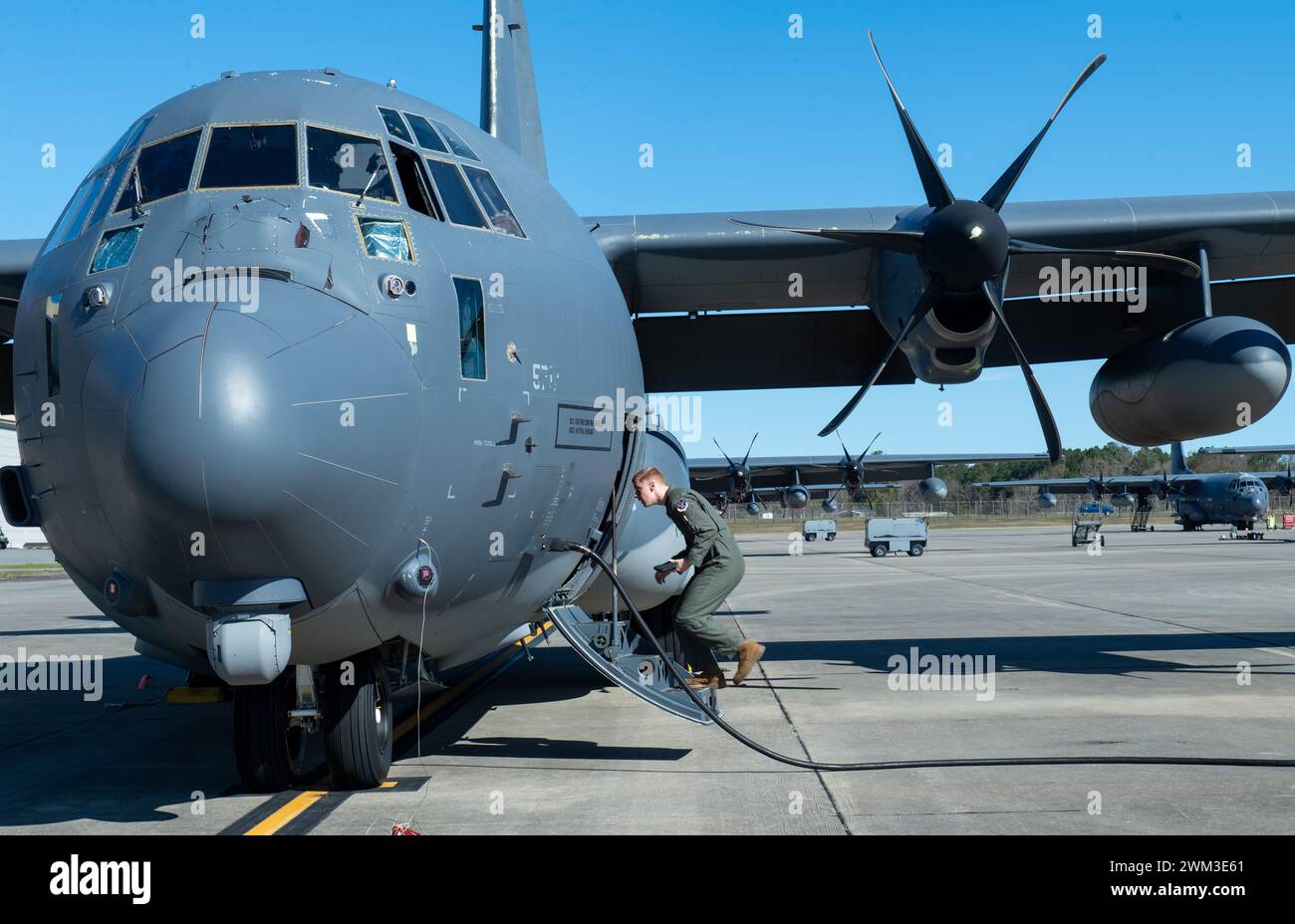 U.S. Air Force Airman 1st Class Blake Daggy, 71st Rescue Squadron loadmaster, boards an HC-130J Combat King II at Moody Air Force Base, Georgia, Feb. 13, 2024. Daggy performed an in-flight refueling training to prepare him for exercise Ready Tiger in April. (U.S. Air Force photo by Airman Cade Ellis) Stock Photo