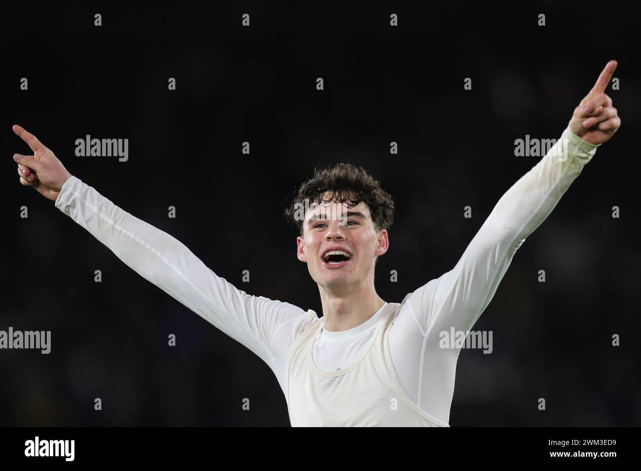 Archie Gray of Leeds United celebrates in front of the supporters after ...