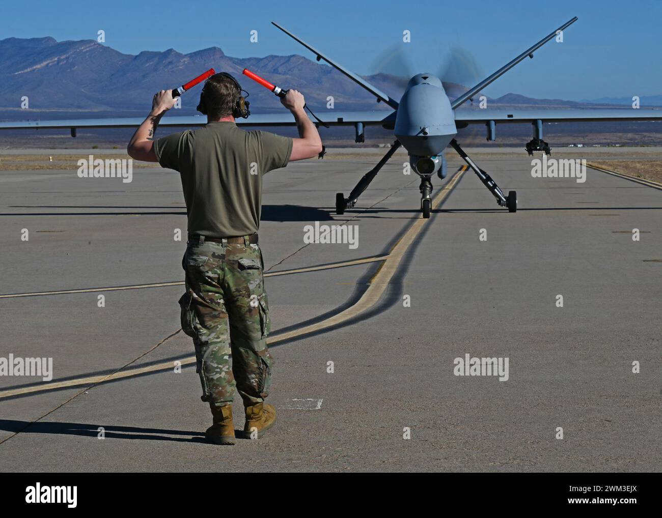 A U.S. service member assigned to Fort Huachuca, Ariz., taxis in an MQ ...