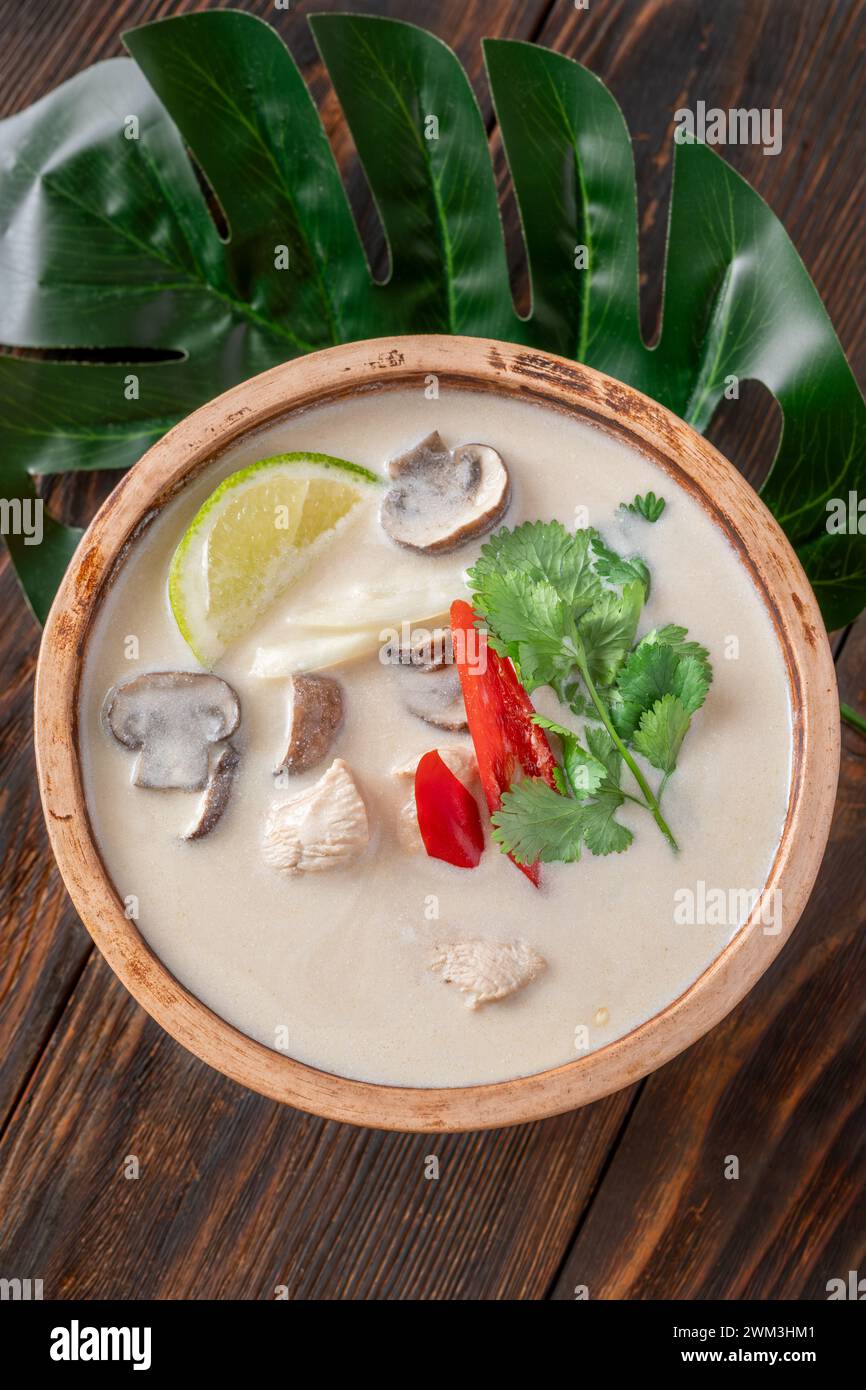 Bowl of thai Tom Kha Kai soup Stock Photo
