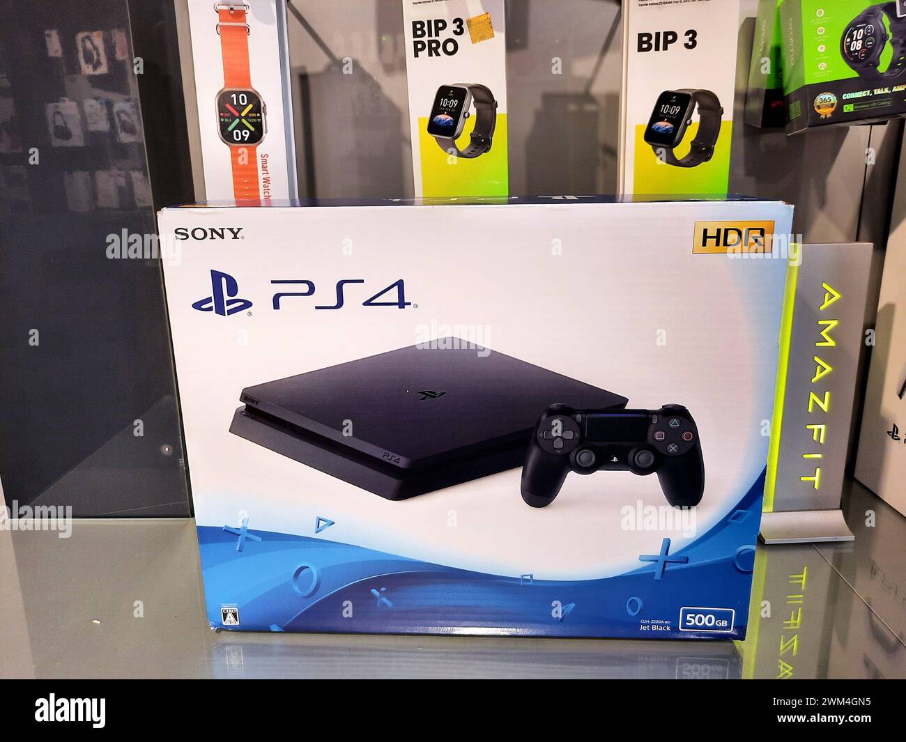 Cairo, Egypt, February 9 2024: The PlayStation 4 (PS4), a home video game console developed by Sony Interactive Entertainment. Announced as the succes Stock Photo