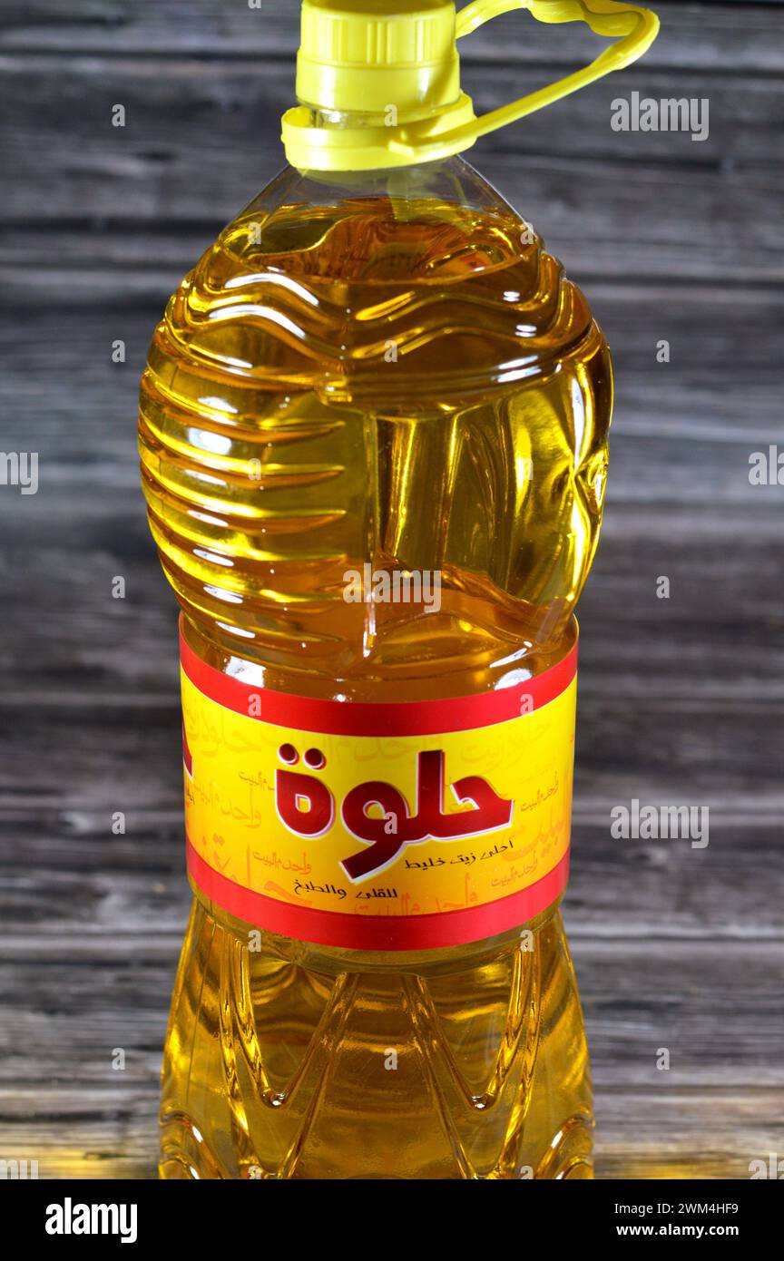 Cairo, Egypt, February 19 2024: Helwa Food oil that is of mixture of sunflower, soybean, natural oil, has multi uses in kitchen in cooking various foo Stock Photo