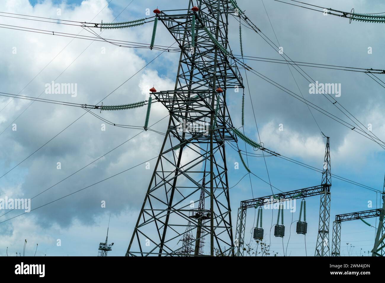 High voltage towers with sky background. Power line support with wires ...
