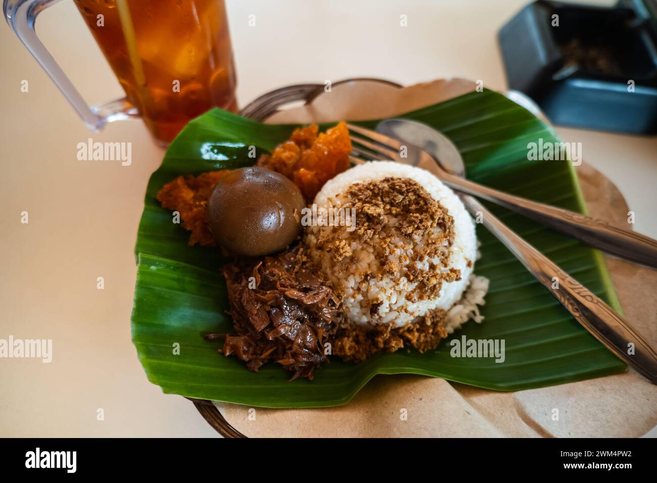 Gudeg, a famous dish from Yogjakarta, Indonesia at street food restaurant Stock Photo