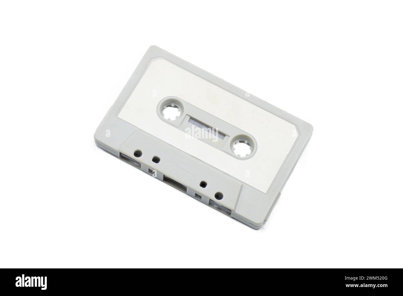 close up of vintage audio tape cassette blank and empty to add your own words and design. isolated on white background with clipping path top view Stock Photo