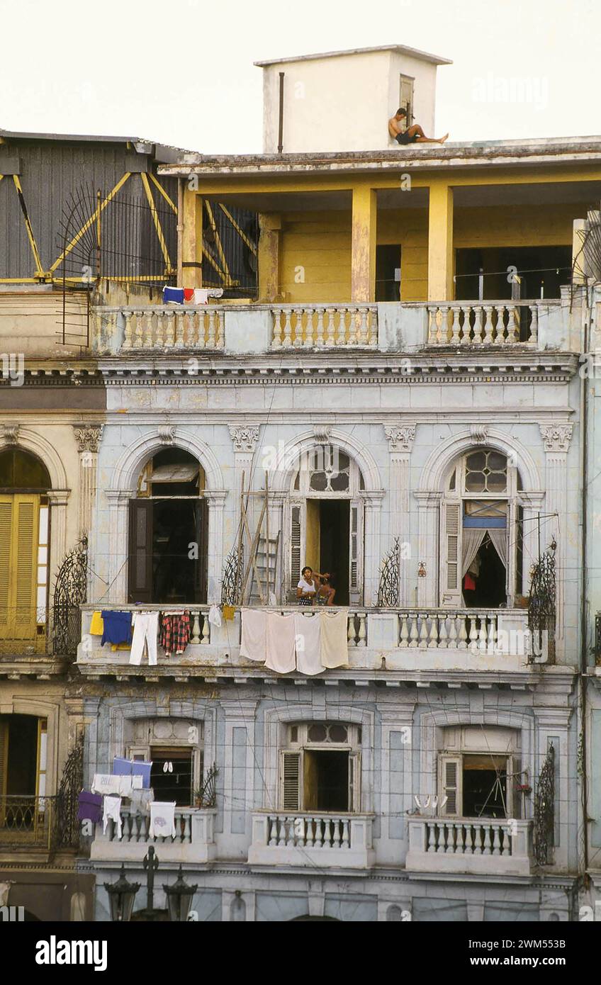 This man in Havana is looking for peace and quiet on the roof of his house. Stock Photo