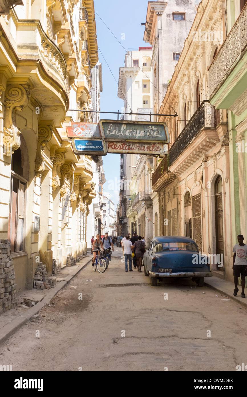 Old advertisement from the 1950s for a restaurant on the streets of Havana. Stock Photo