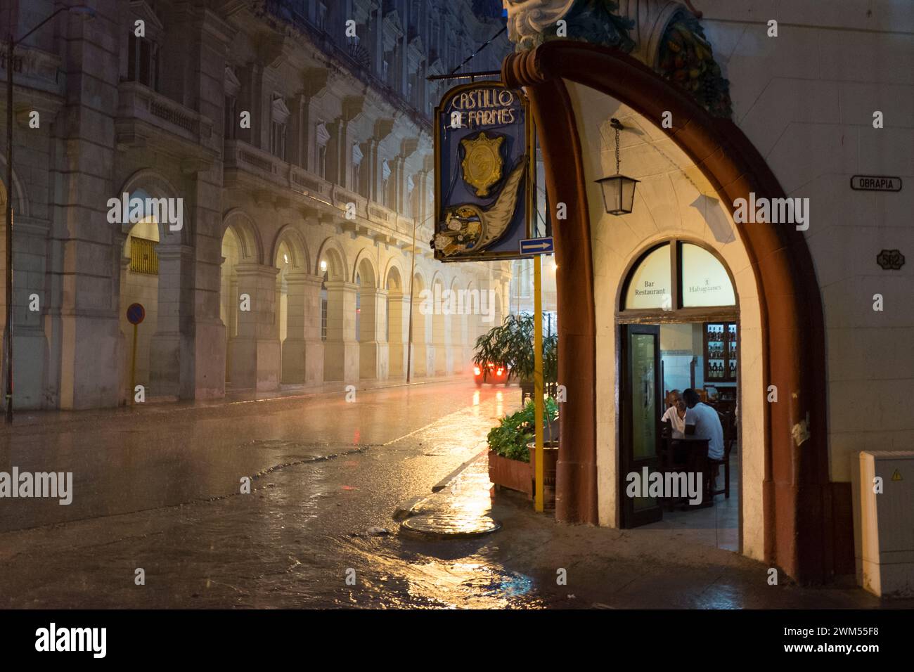 Montserrate Street in Old Havana during a downpour. Stock Photo