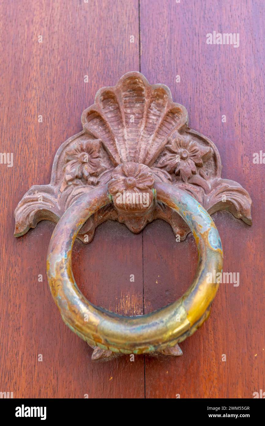 Door knocker on a door in Mallorca Stock Photo