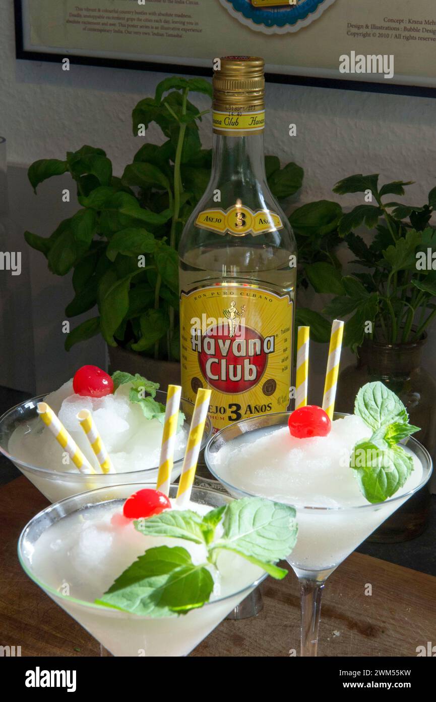Daiquiri cocktails in front of a bottle of Havana Club Rum. Stock Photo